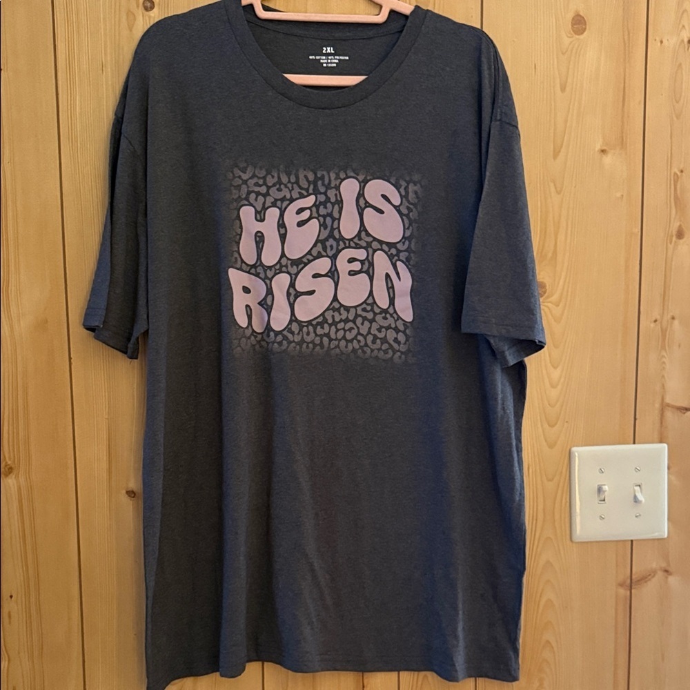 Soft Black Women's Graphic Tee with Pink 'He Is Risen' Print
